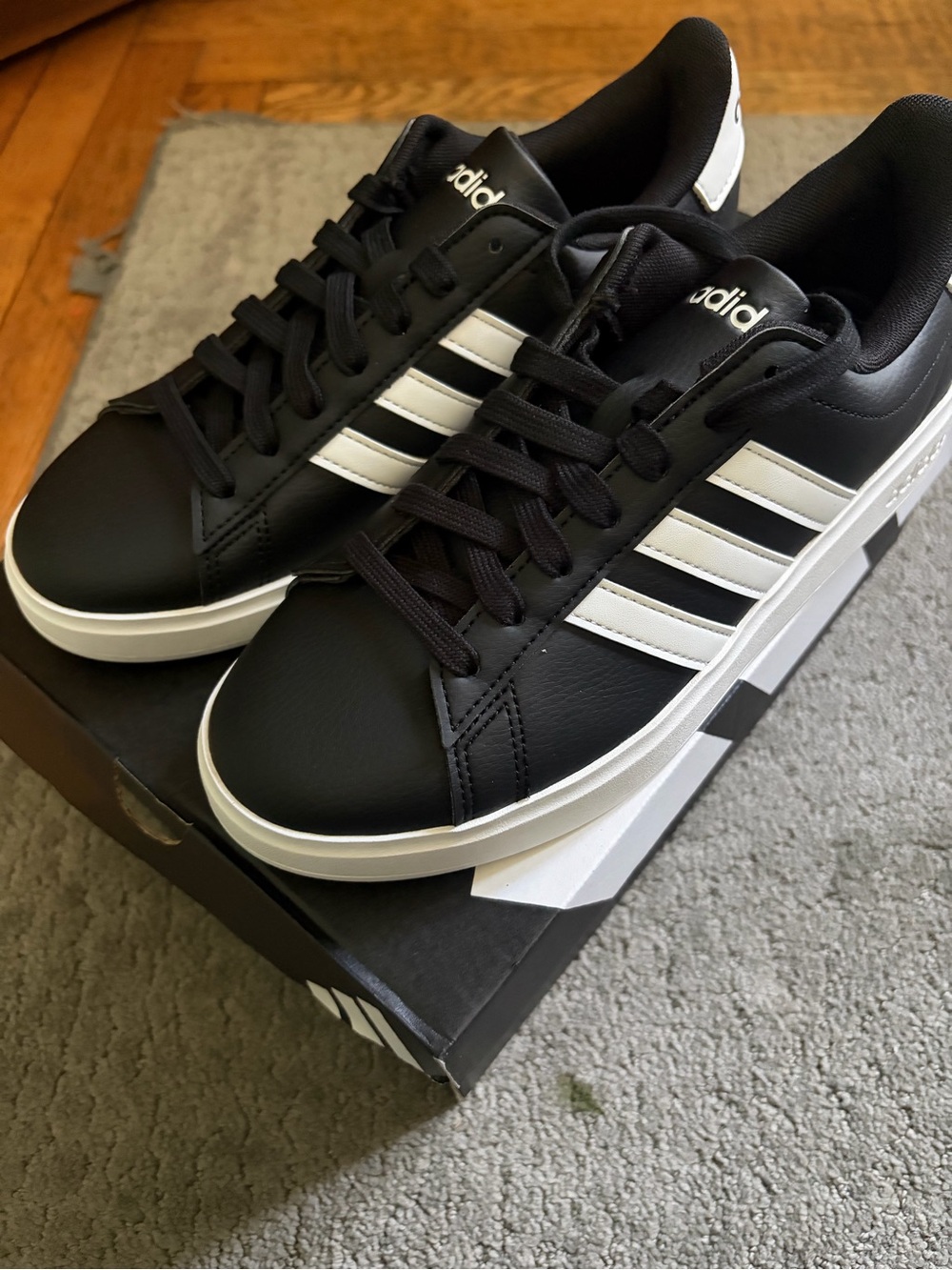 adidas Men’s Black & White Classic Three-Stripe Sneakers